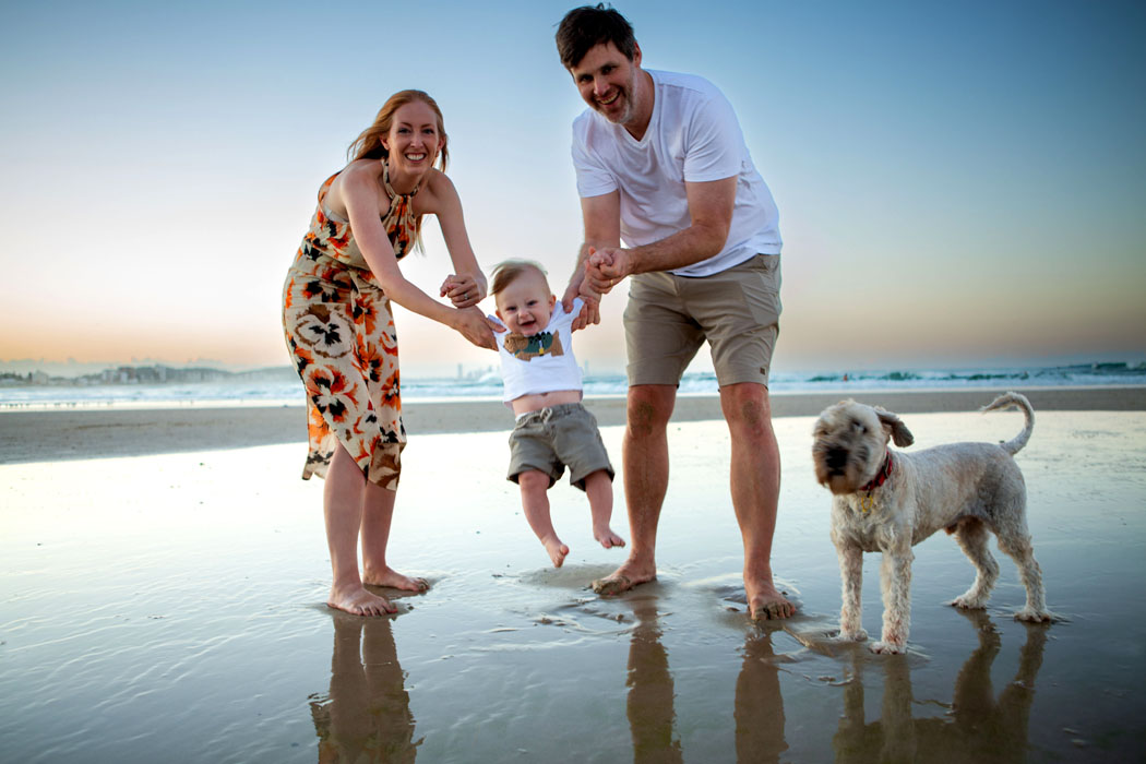 Family at sunset, Currumbin Beach, Gold Coast. Mum, dad, 1 year old and dog